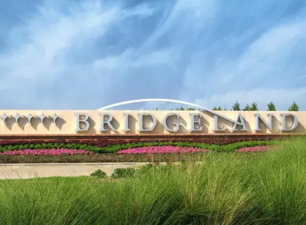 The Bridgeland community entrance monument in Cypress, TX, representing the local area served by AsterSmiles dental care.