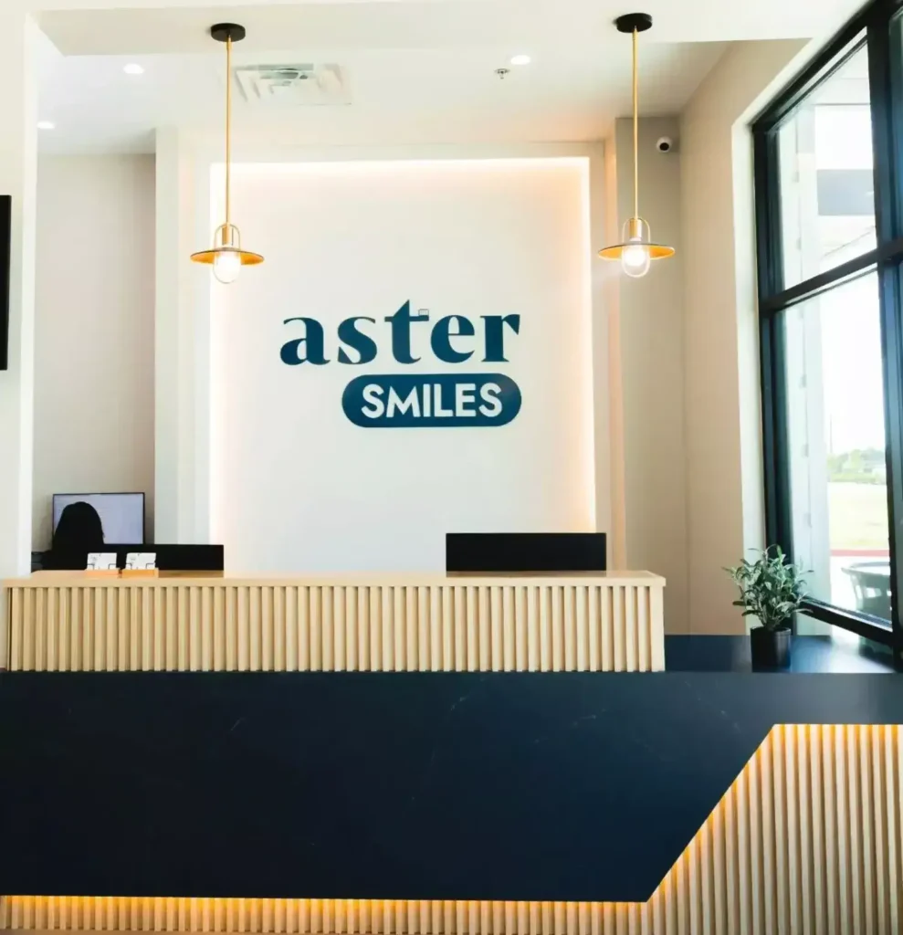 The modern and elegant reception area at AsterSmiles, designed to provide a welcoming atmosphere; your premier dentist in Cypress for high-quality care.